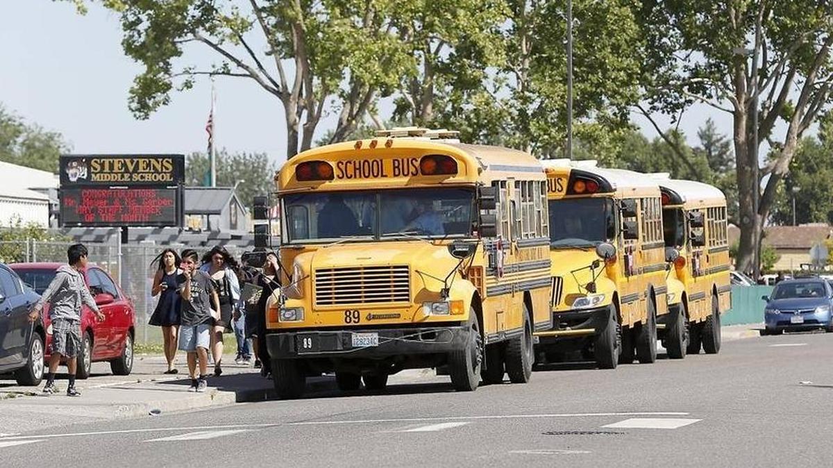 Students get on the bus outside Stevens Middle School in Pasco. Pasco, Richland and Kennewick schools are likely to see an increase in funding after the passage of the state budget.