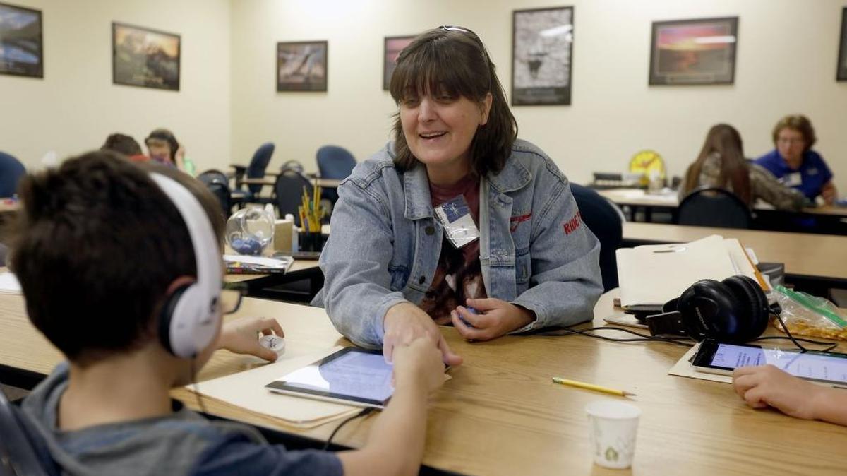 Tutor Shelly Wandler works with a student at the Sylvan Learning Center on Keene Road in Richland. The company is soon expanding with a second location in the Tri-Cities and a location in Yakima.