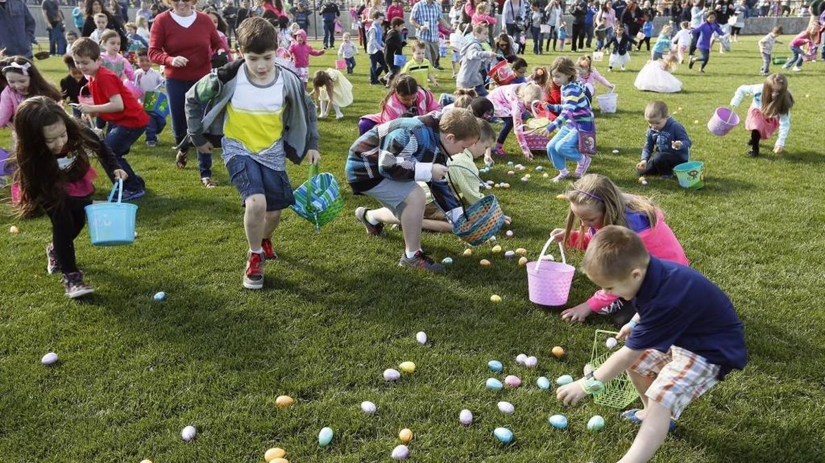 Hundreds of children scrambled for Easter eggs at the Southridge Sports Complex in Kennewick. The wave of egg hunters descended upon the field before the horn sounded, unable to delay their search for the brightly colored prizes.
