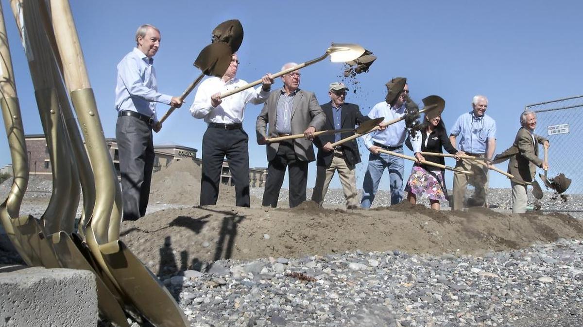 
Walla Walla native Tom Drumheller, far left, of Escape Lodging, is joined by local dignitaries and his partner, Bob Naito, far right, at a ceremonial ground-breaking Monday for their new boutique hotel called The Lodge. The new construction is at 530 Columbia Point Drive in Richland.
