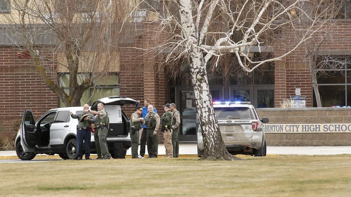 Law enforcement and school officials set up a mobile command post Wednesday in front of Kiona-Benton City High School after rumors that a student had a gun. No weapon was found.