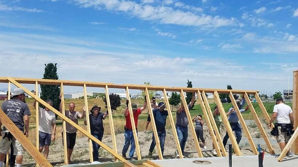 Habitat for Humanity volunteers work on a home in Pasco earlier this year. The nonprofit is launching a holiday fundraising campaign called “Give Something that Means Something.”
