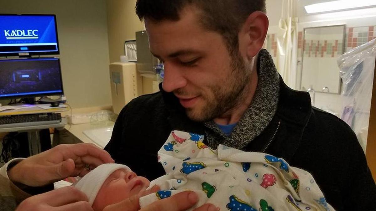 Andrew Luttrell with his nephew, Noah.