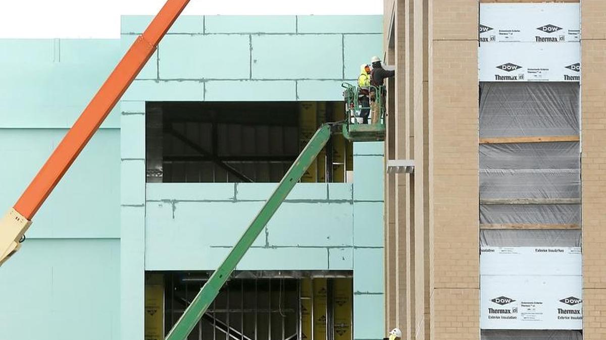 Construction crews work Tuesday at Columbia Basin College's $16.1 million Wortman Medical Center on Northgate Drive in Richland. The college's second health science center will house training facilitates for CBC healthcare professions and Kadlec Regional Medical Center’s residency program. The four-story, 72,600-square-foot building is expected be completed later this year.