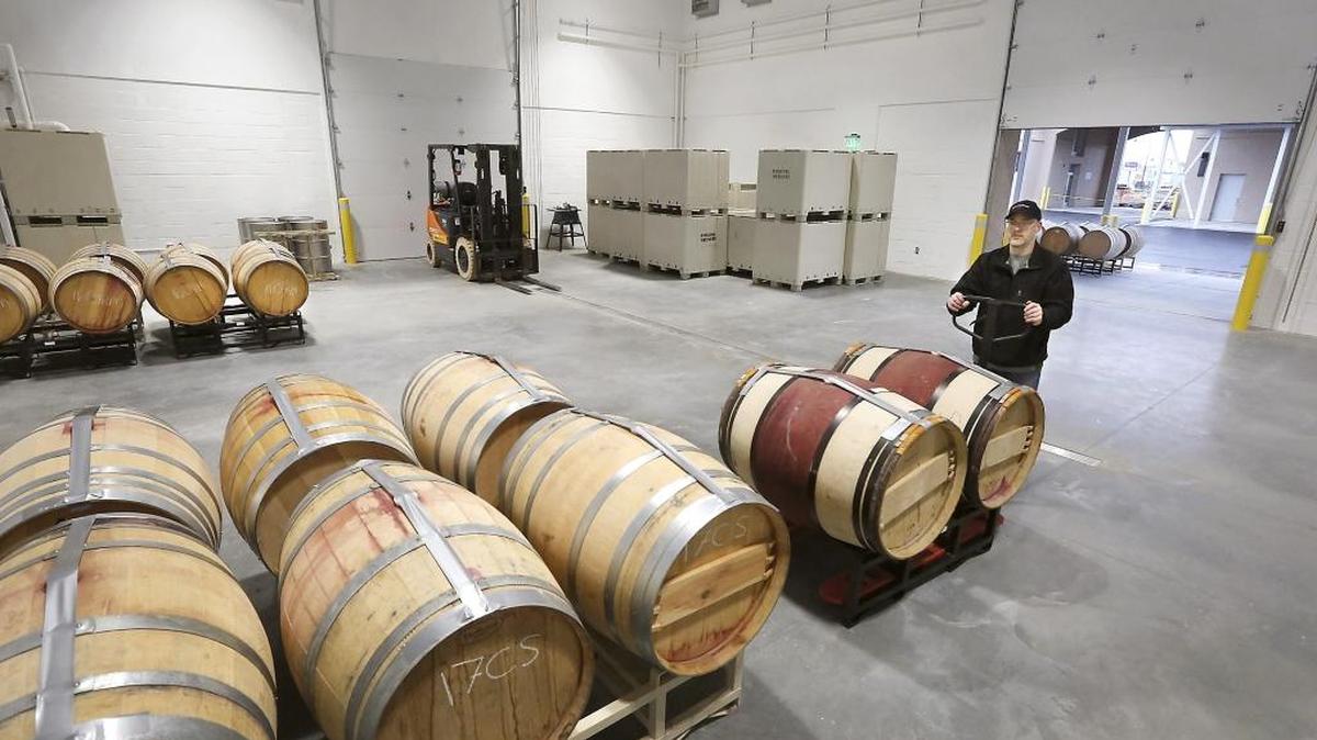 Bart Fawbush, winemaker and owner of Bartholomew Winery, moves his first truckload of 40 filled wine barrels Tuesday morning into his new space at the Port of Kennewick's Columbia Gardens Wine and Artisan Village. The move comes after last year’s harsh winter weather delayed construction of the new facility in the 400 block of East Columbia Drive in Kennewick. Fawbush, previously based in Seattle, said he expects to open the new tasting room in December. Watch a video at tricityherald.com/video