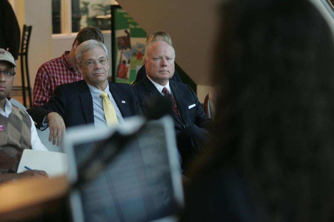 State Rep. Larry Haler, R-Richland, left, and attorney Fran Forgette, a regent for Washington State University, attend a WSU Tri-Cities student voting. The forum in this 2011 photo.