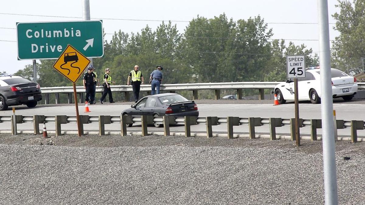 Troopers from the Washington State Patrol and Kennewick Police officers investigate the scene of Friday morning's motorcycle crash in the southbound lanes of Highway 395 heading into Kennewick from the base of the blue bridge. Julio Urena, 24, went off the roadway, struck the guardrail and was thrown from his Yamaha motorcycle. The Washington State Patrol reports speed was the cause of the wreck and cited Urena for reckless driving. The Kennewick man was taken to Kadlec Regional Medical Center with serious injuries, according to Kennewick fire officials. Urena was wearing a helmet.