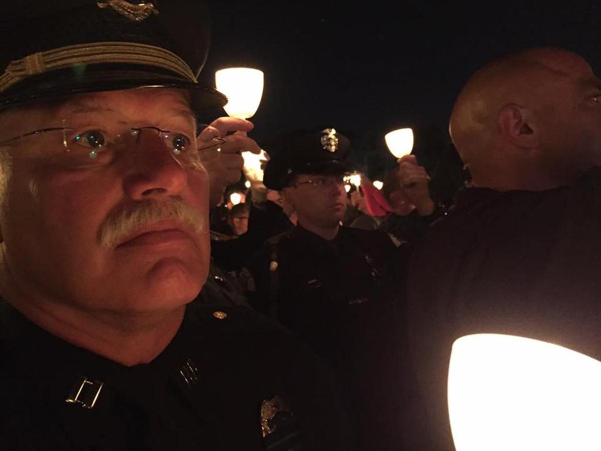 Richland police Capt. Mike Cobb, left, and his son, Pasco police officer Jeff Cobb, attended a candlelight vigil in Washington, D.C., during National Police Week.