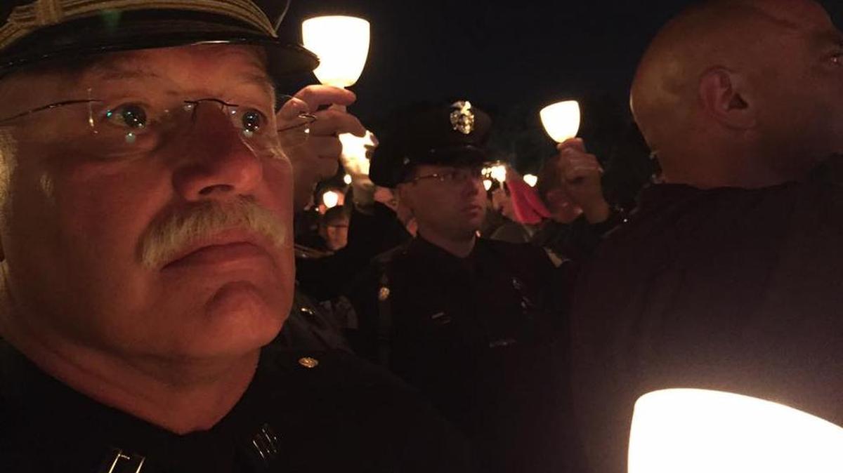 Richland police Capt. Mike Cobb, left, and his son, Pasco police officer Jeff Cobb, attended a candlelight vigil in Washington, D.C., during National Police Week.