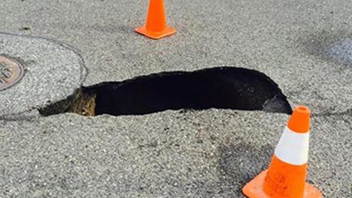 Sinkhole in the area of 11th Place and Newport Street.