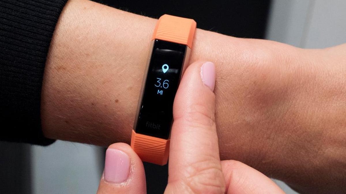 In this March 1, 2017 photo, Fitbit’s new Alta HR device is displayed in New York. The company known for encouraging people to walk 10,000 steps each day, now wants to put them to sleep as well.