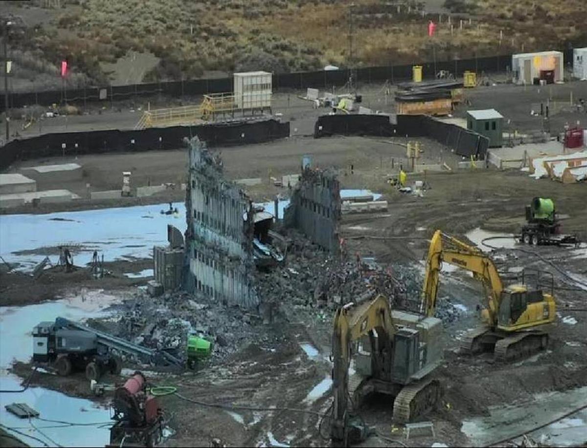 Workers on Friday torn down what was left of the canyon walls at the Plutonium Reclamation Facility of the Hanford nuclear reservation’s Plutonium Finishing Plant.