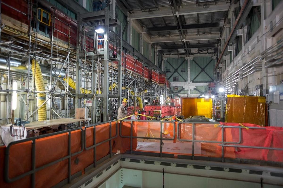 An employee walks through the process cell bay in the Low Activity Waste Facility at the Hanford nuclear reservation’s vitrification plant.