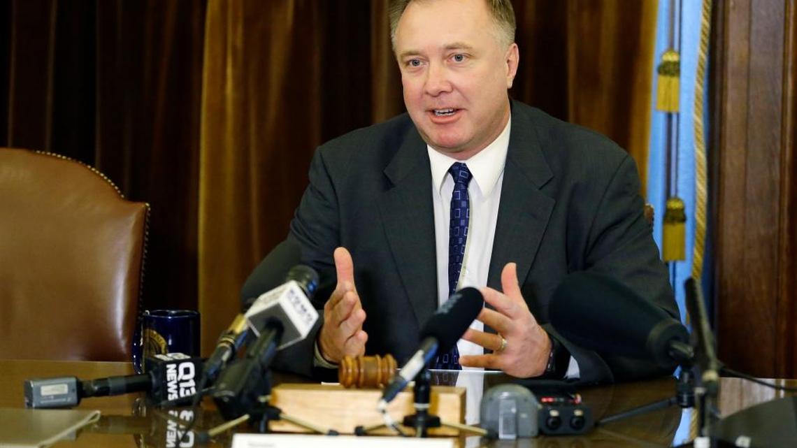 Washington Sen. Doug Ericksen, R-Ferndale, talks to reporters Thursday at the Capitol in Olympia. Ericksen is currently serving as both a state senator and a member of President Donald Trump's transition team.