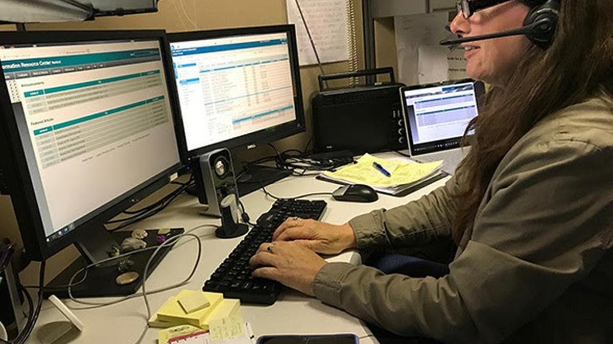 i-3 Global employee Sharon Gest provides information technology support to workers at the Hanford nuclear reservation.