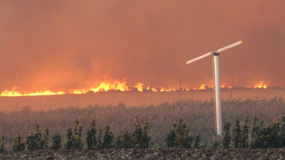 A fire burning on the Yakima Training Center near Moxee, shown here, has spread into Benton County near the Hanford nuclear reservation.
