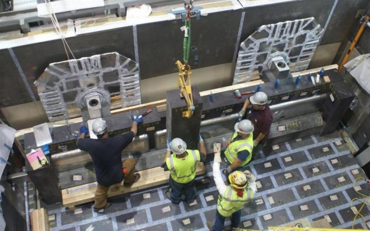 Workers in 2014 install refractory brick in a melter at the Hanford vitrification plant’s Low Activity Waste Facility. Installation of both of the facility’s melters were completed in 2017, meeting a contract requirement for Bechtel National.