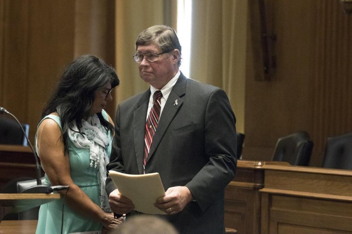 Walt Tamosaitis prepares to speak during a press conference in 2016 on whistleblower retaliation by contractors. Sandra Black, who was fired after reporting health and safety concerns about the Department of Energy’s nuclear program, steps away from the podium.