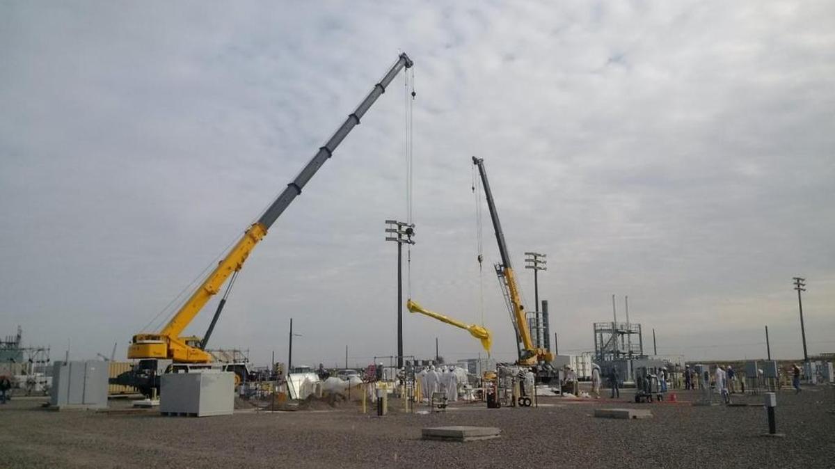 A pump is lifted from double-shell Tank AP-02 to replace it with a more efficient pump for work to accept waste from the Hanford double-shell tank with a leak between its shells. In fiscal 2015, Washington River Protection Solutions “exceeded many of the significant award fee criteria and has met overall cost, schedule and technical performance requirements,” DOE said.