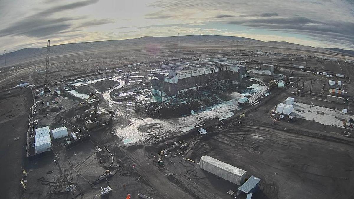 Only part of the main production area of the Plutonium Finishing Plant remains to be demolished. Blue areas are where fixative has been applied to contain the airborne spread of radioactive particles.