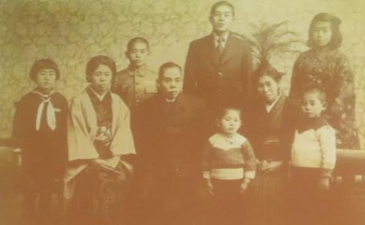 Mitsugi Moriguchi, of Nagasaki, Japan, showed this photo of his family taken in 1941 at talks he gave during a visit to the Mid-Columbia. He’s on the bottom right.