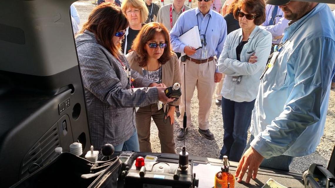 
Monica Regalbuto, Department of Energy assistant secretary for environmental management, second from left, looks at some of the equipment DOE is using or exploring for use in the Hanford tank farms.
