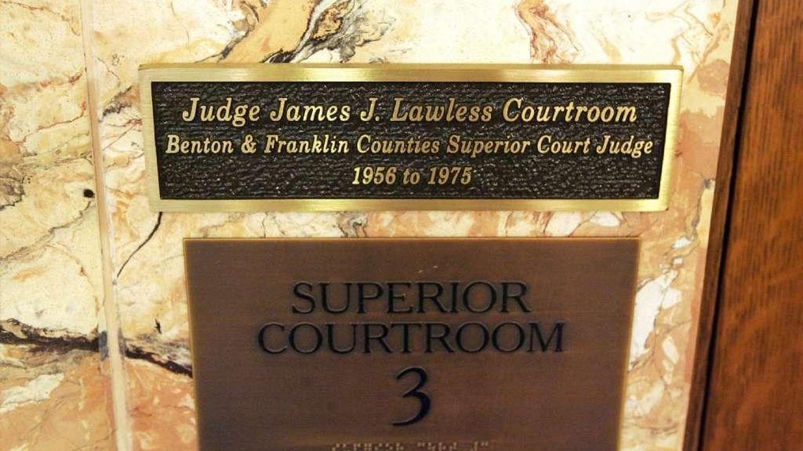 A sign in the rotunda of the Franklin County Courthouse in Pasco pays tribute to Judge James Lawless.