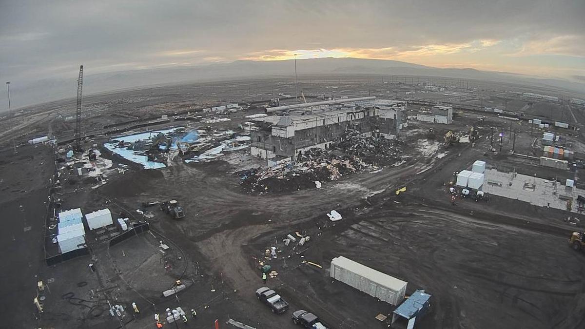 The patch of blue from fixative used to contain the spread of plutonium at the Plutonium Reclamation Facility shows where the facility stood before demolition was completed on Friday. To the right is what remains of the main processing area of the Plutonium Finishing Plant. The buildings once were connected.