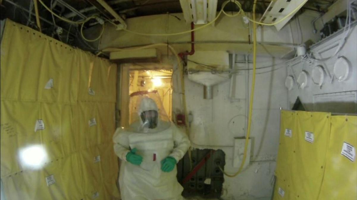 Hanford workers wear air-cooled suits for work at the Plutonium Finishing Plant in areas where there are high amounts of airborne radioactive contaminants. The Department of Energy has checked for radiation contamination in three states after potentially contaminated equipment left Hanford.