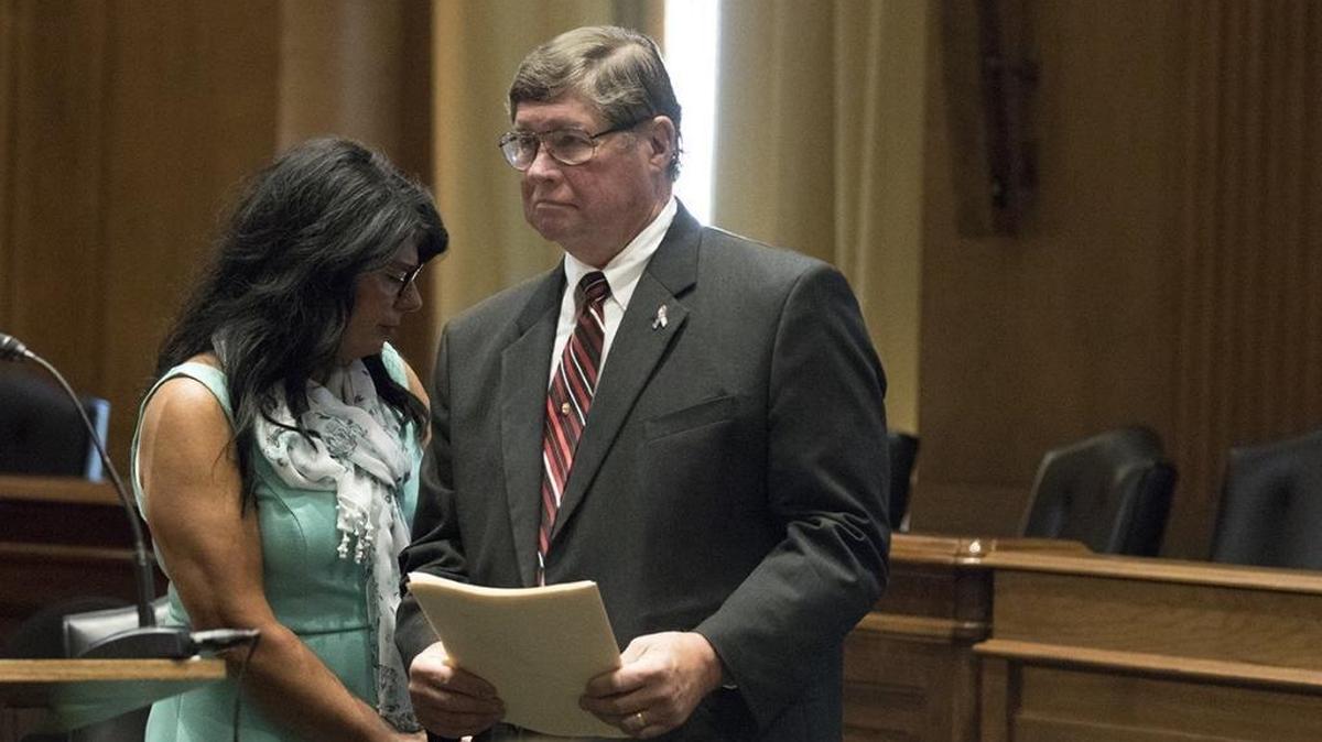 Walt Tamosaitis prepares to speak during a press conference Thursday on whistleblower retaliation by contractors. Sandra Black, who was fired after reporting health and safety concerns about the Department of Energy’s nuclear program, steps away from the podium.