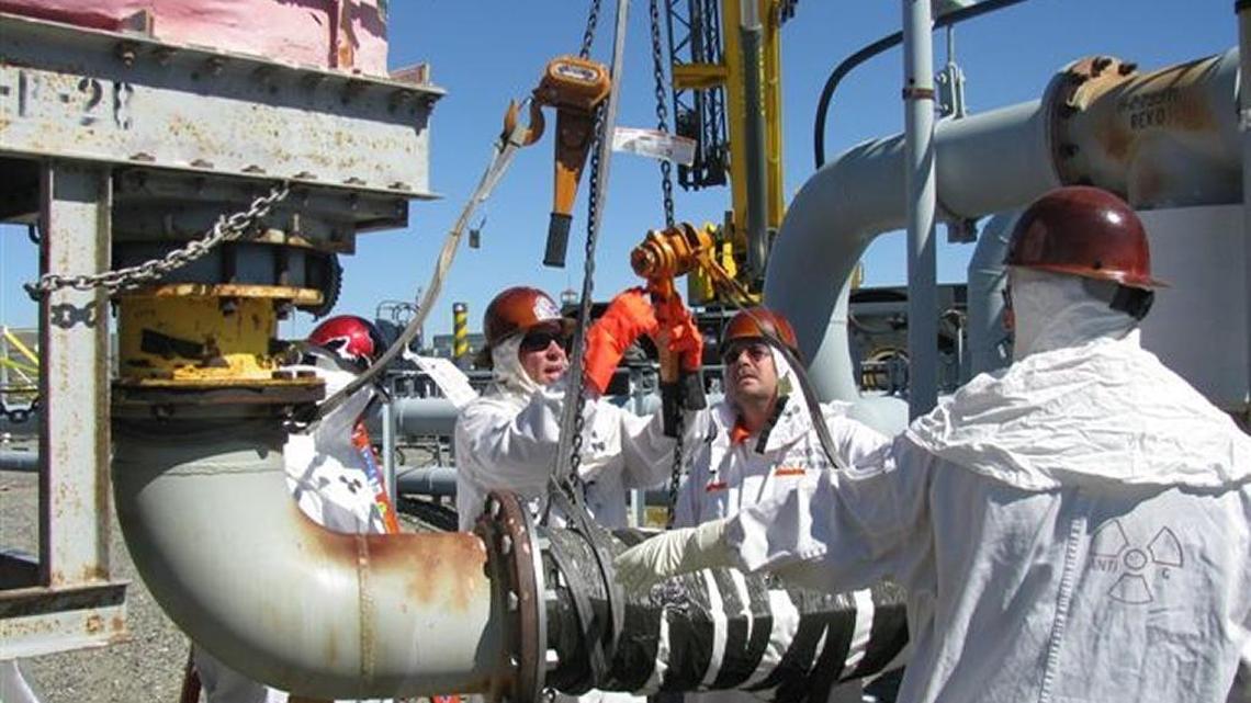 An obsolete exhauster in the Hanford SY Tank Farm is being dismantled and removed.