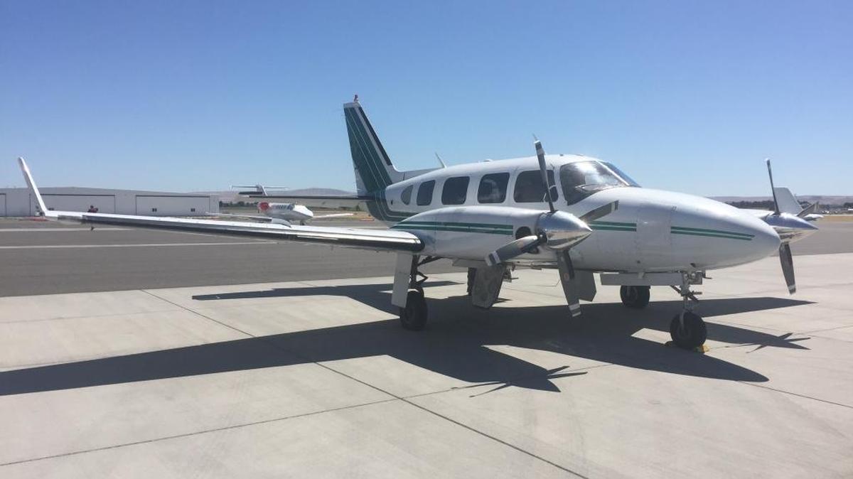 A small plane, shown in Pasco, will be used during the early morning hours this week to collect thermal images of central Hanford to help identify where radioactive waste may be buried.
