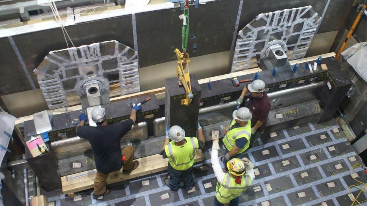Bechtel National subcontractors install refractory brick in 2014 in a Low Activity Waste Facility melter at the Hanford nuclear reservation’s vitrification plant. The facility’s first melter has been assembled, meeting a construction milestone.