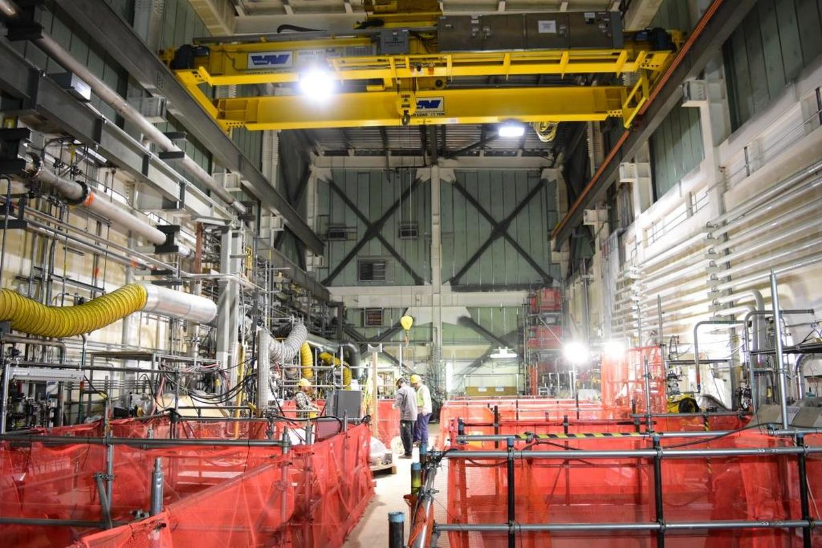 Workers at the Hanford nuclear reservation prepare rigging in the vitrification plant’s Low-Activity Waste Facility. The facility could start treatint low activity radioactive waste in 2022.