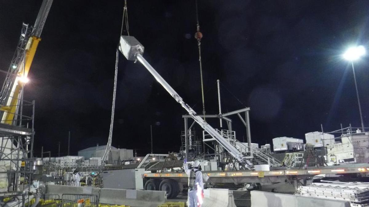 An extended reach sluicing system is installed in Hanford’s underground Tank C-105 to restart work to empty the tank of its remaining 30,000 gallons of radioactive waste.