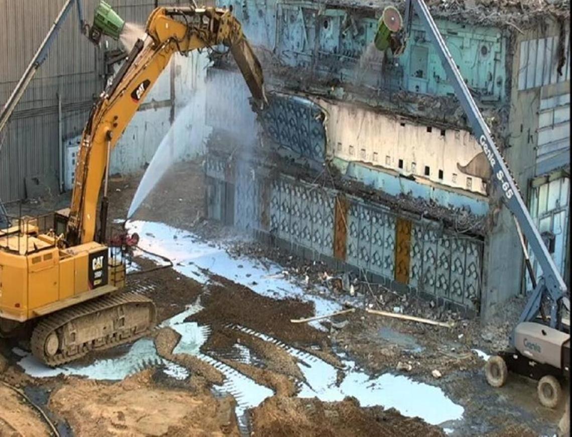 The open-air demolition of the Plutonium Reclamation Facility is shown before it was torn down to a central, highly radioactively canyon area at its center.