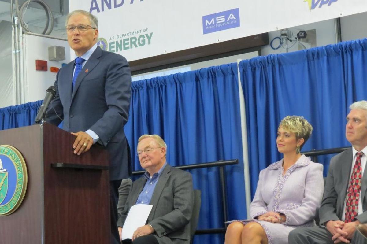 Washington Gov. Jay Inslee talks about the importance of the HAMMER training center at its 20th anniversary celebration Oct. 5. Listening, from left, are Gary Petersen, retired Tri-City Development Council vice president; Ashley Morris, Department of Energy senior adviser for HAMMER, and Ken Niles, assistant director of the Oregon Department of Energy.