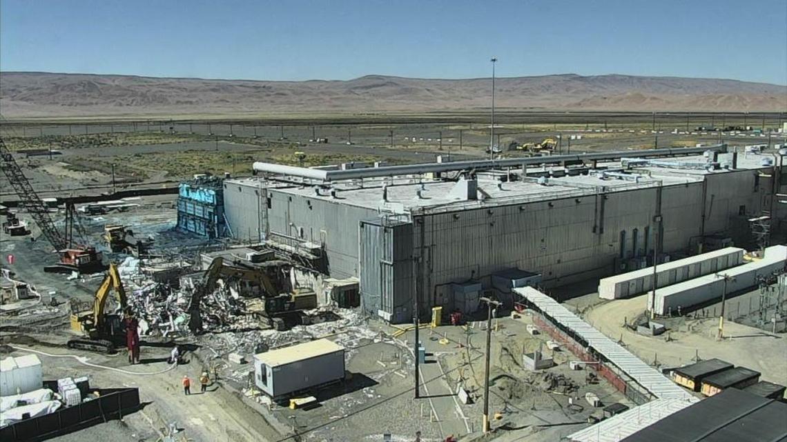 Demolition is shown the day after work started on July 26 on one of the least contaminated portions of Z Plant and Hanford’s Plutonium Finishing Plant.