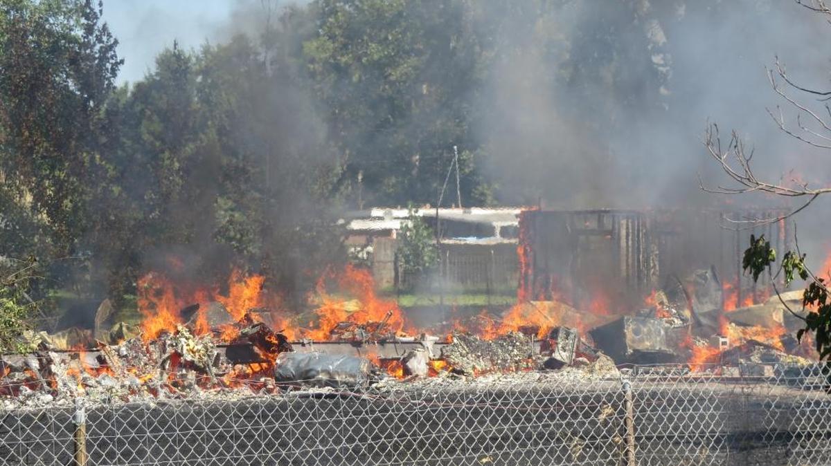A fire tore through a manufactured home on Gum Street Wednesday afternoon.