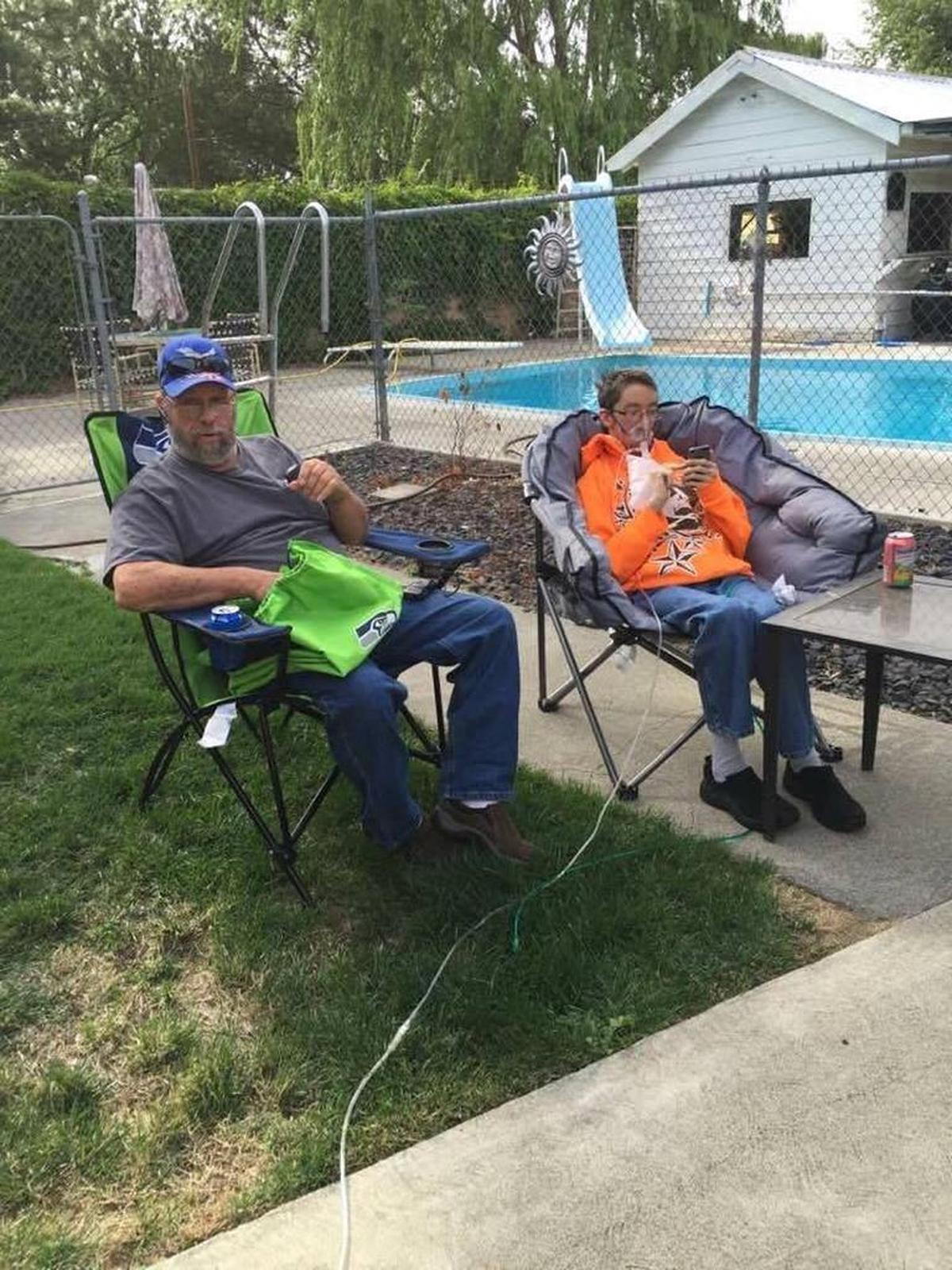 Gary Hinman, left, and his son, Jason Harris, before their move last year to Connecticut.
