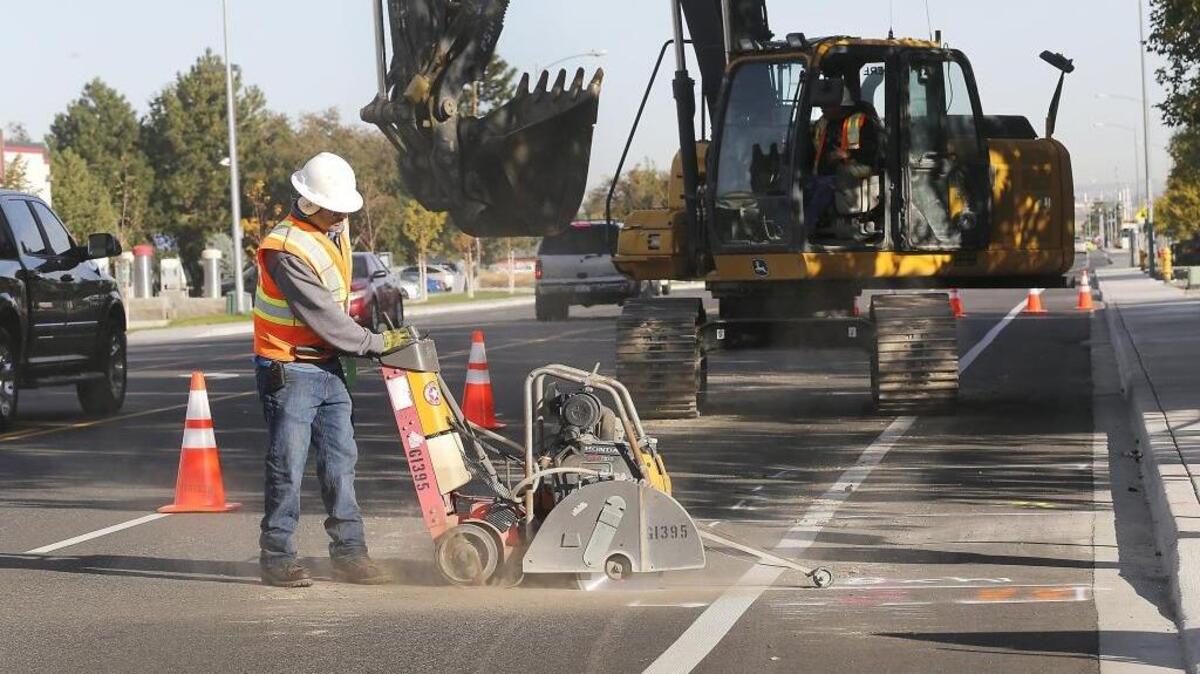 Kennewick Irrigation District employees begin fixing an underground concrete irrigation line Monday morning on the 500 block of North Edison Street in Kennewick. The estimated 36-inch pipe started leaking after a widening project of the street by the city, said KID district manager Chuck Freeman. The city will pay for the repairs under a three-year agreement with KID. Repairs should be done by Wednesday afternoon. KID stills plans to shutdown all its water service Oct. 13.