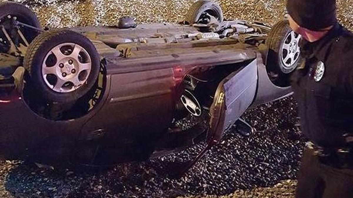 A woman was pulled from this rolled over vehicle near the blue bridge on the Kennewick side of the Columbia River after it crashed late Thursday night