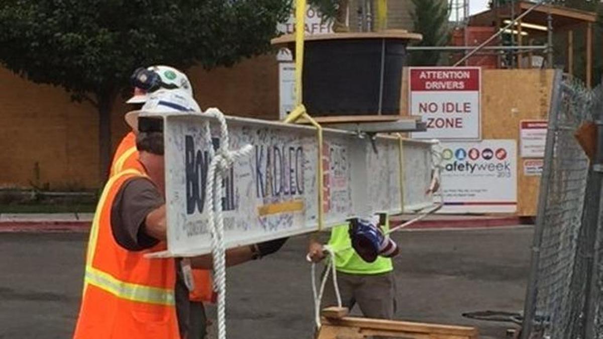 
Construction crews lift the final piece of steel into place Thursday for Kadlec Regional Medical Center’s River Pavilion patient tower expansion at the hospital campus in Richland. The beam was painted white and hundreds of Kadlec caregivers signed their names to it throughout the week. The $72 million, four-floor project is set to open in October 2016.
