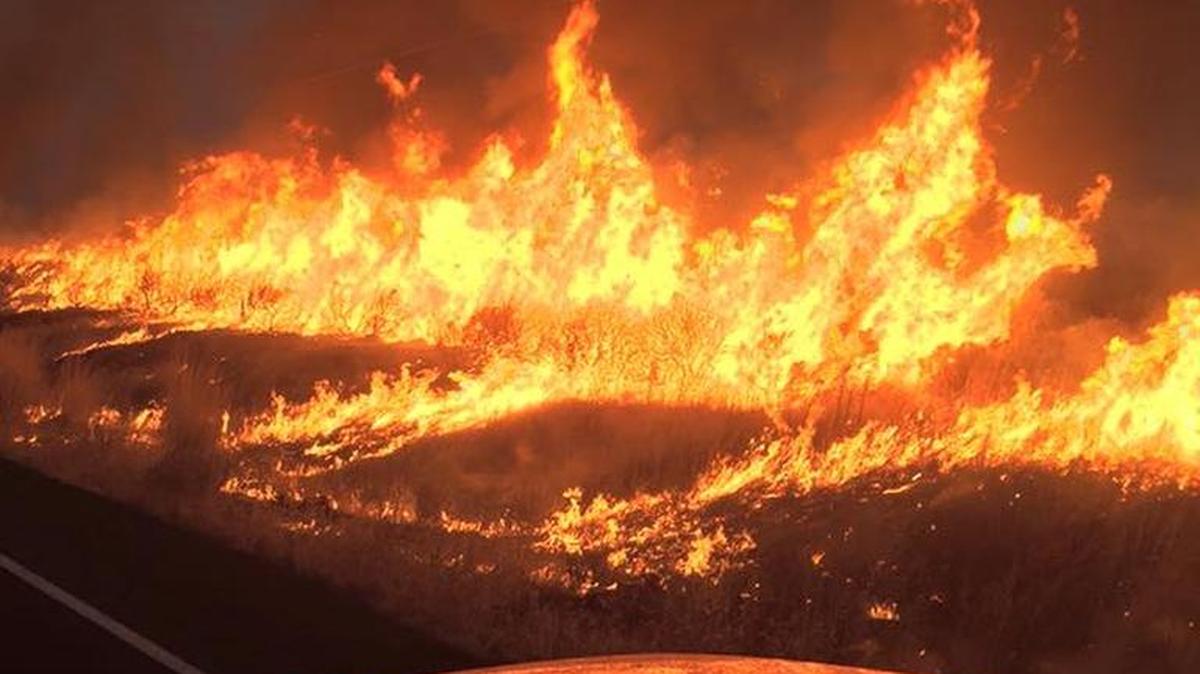 Crews from Franklin Fire District 4 responded to assist Franklin Fire District 1 and several other fire crews on a blaze that started near Connell on Cobb Road and continues to threaten homes in Kahlotus.