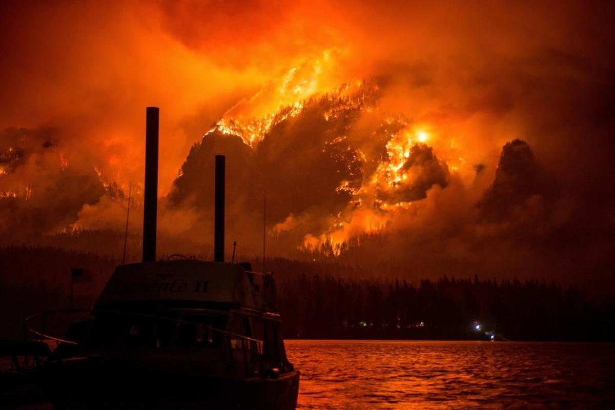Wildfire still is ravaging forest Tuesday behind Bonneville Dam and across the area near Stevenson, Wash. The Eagle Creek fire, shown here Monday night from across the Columbia River Gorge, closed Interstate 84 and continues to burn out of control on both sides of the river. The fire started in Oregon.