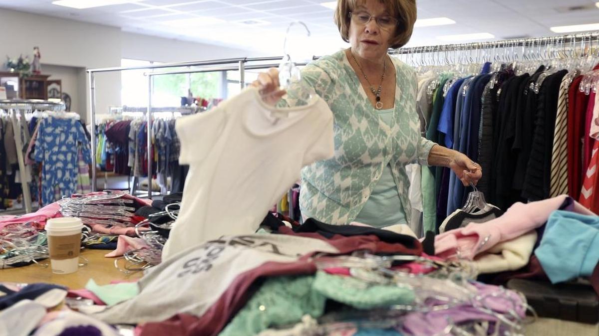 Volunteer Karen Bennett of Richland sorts through children’s clothes Wednesday at the new Seattle Children’s Bargain Boutique at 2810 W. Kenenwick Ave. in Kennewick. The store, with all proceeds benefiting the hospital, is accepting donations and will open June 4. “Seattle sounds so far away but we are really helping lots of kids here,” said manager JoAnn Hoff who has children and grandchildren who have gone to the hospital. See a video: www.tricityherald.com/video.