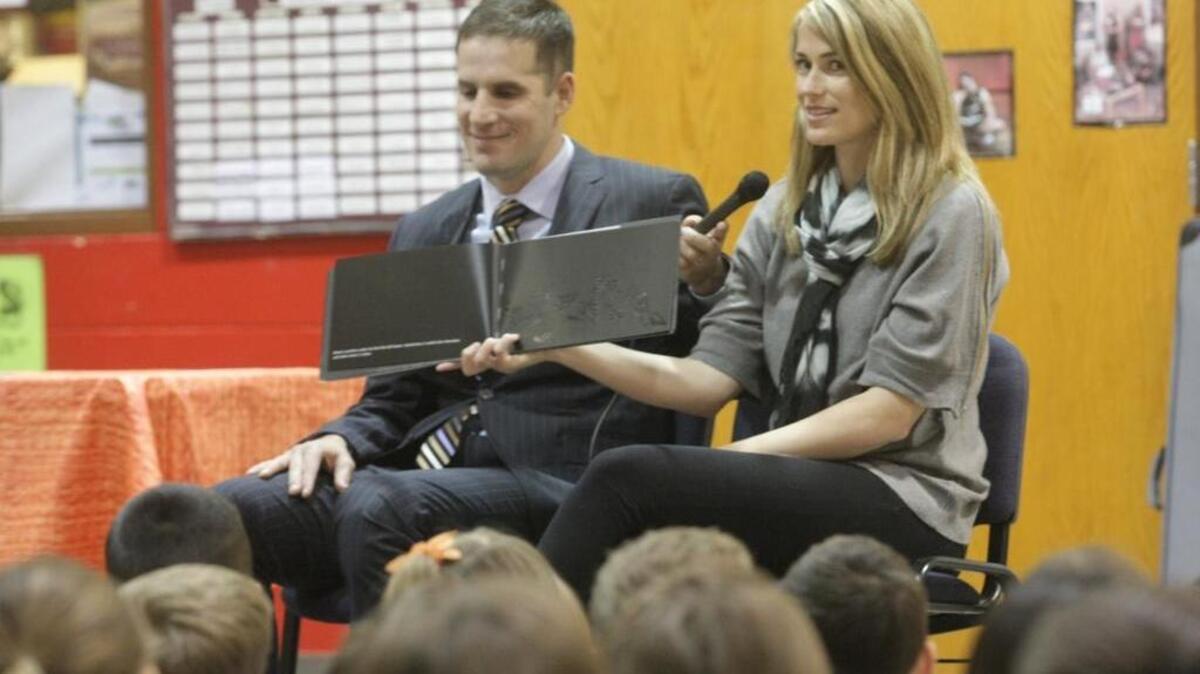 Scott and Tiffany Smiley, speaking at Pasco’s McGee Elementary in 2005, have become advocates for improving services from the Veterans Affairs Administration after he was blinded in a suicide attack in Iraq. Tiffany Smiley has announced her candidacy for the U.S. Senate.