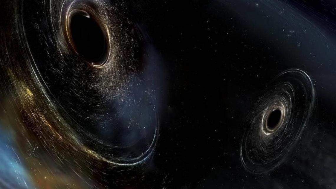 Artist’s conception shows two merging black holes similar to those detected four times now by LIGO. The most recent detection was Aug. 14.