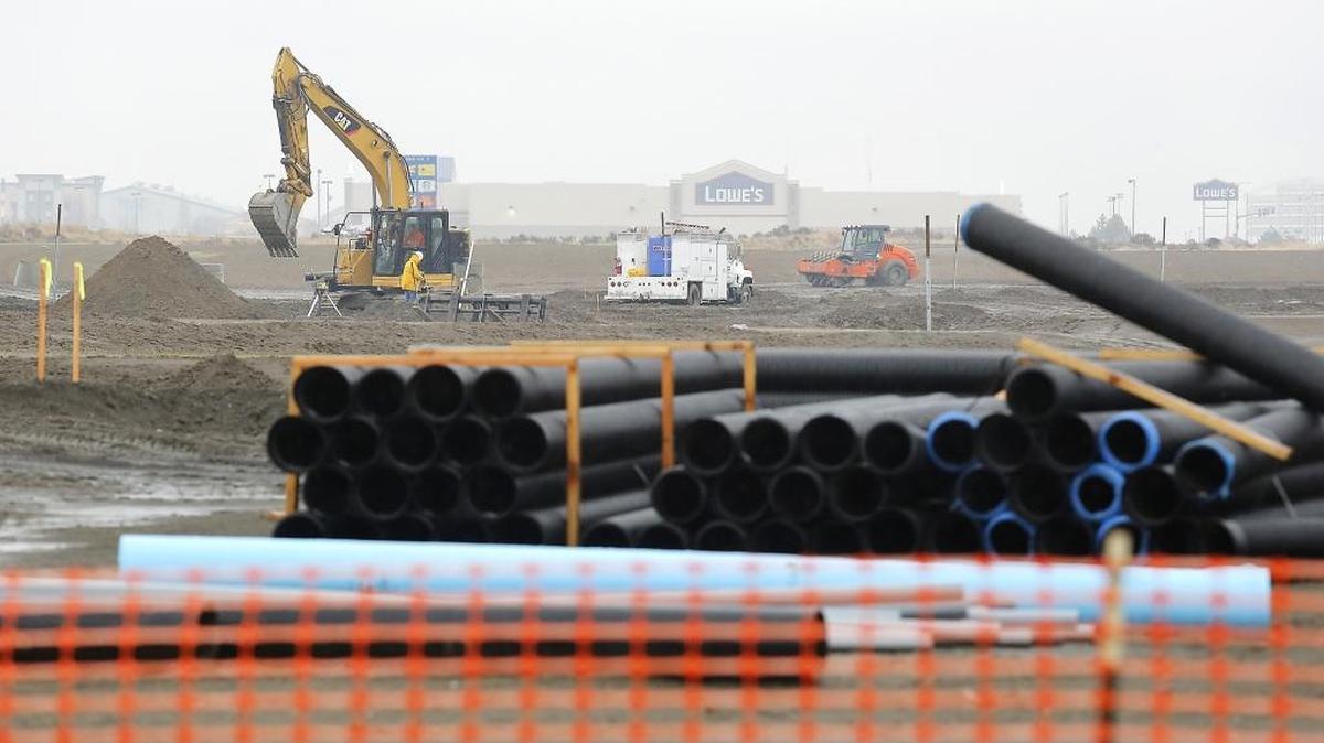 Heavy construction equipment prepares former farm circles east of Road 84 in Pasco for new subdivisions after the Department of Natural Resources sold 230 acres in west Pasco last year. Tri-City home prices and new home development both climbed in 2017. The city of Pasco expects 300 new lots to come on line at the new site in 2018.