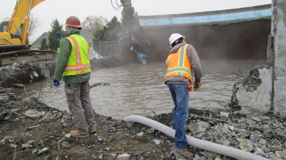 The old water tank at the McNary Dam is being demolished for removal.